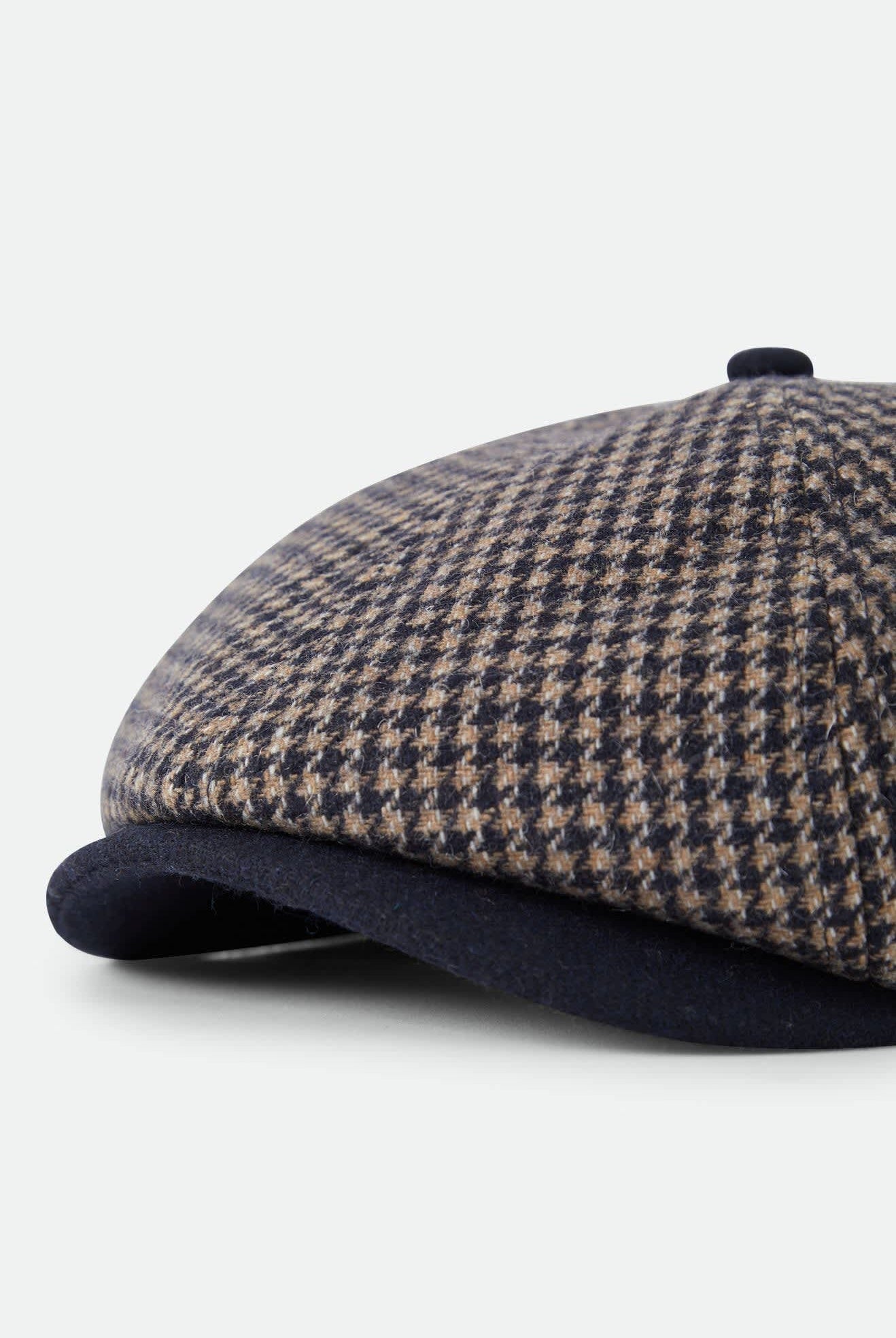 Unisex Brood Newsboy Cap in the color Navy/Sand Houndstooth - Additional Laydown image