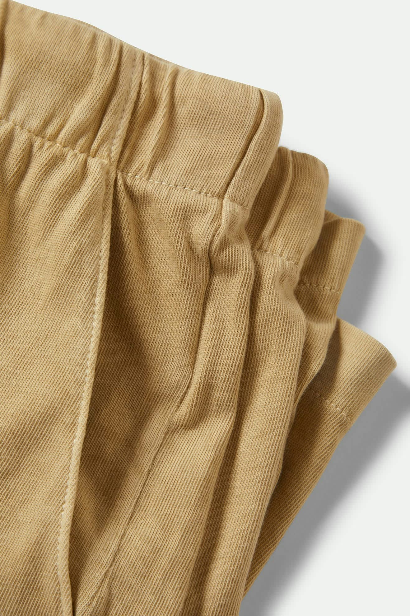 Women's Carefree Organic Garment Dyed Lounge Short in the color Pale Khaki - Additional Laydown image