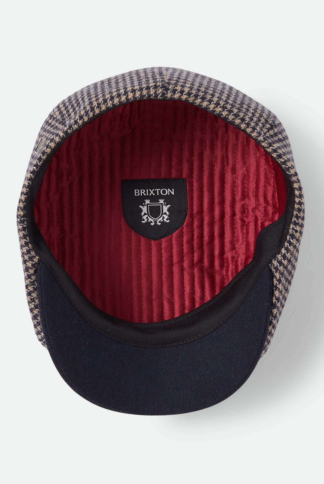 Unisex Brood Newsboy Cap in the color Navy/Sand Houndstooth - Additional Laydown image