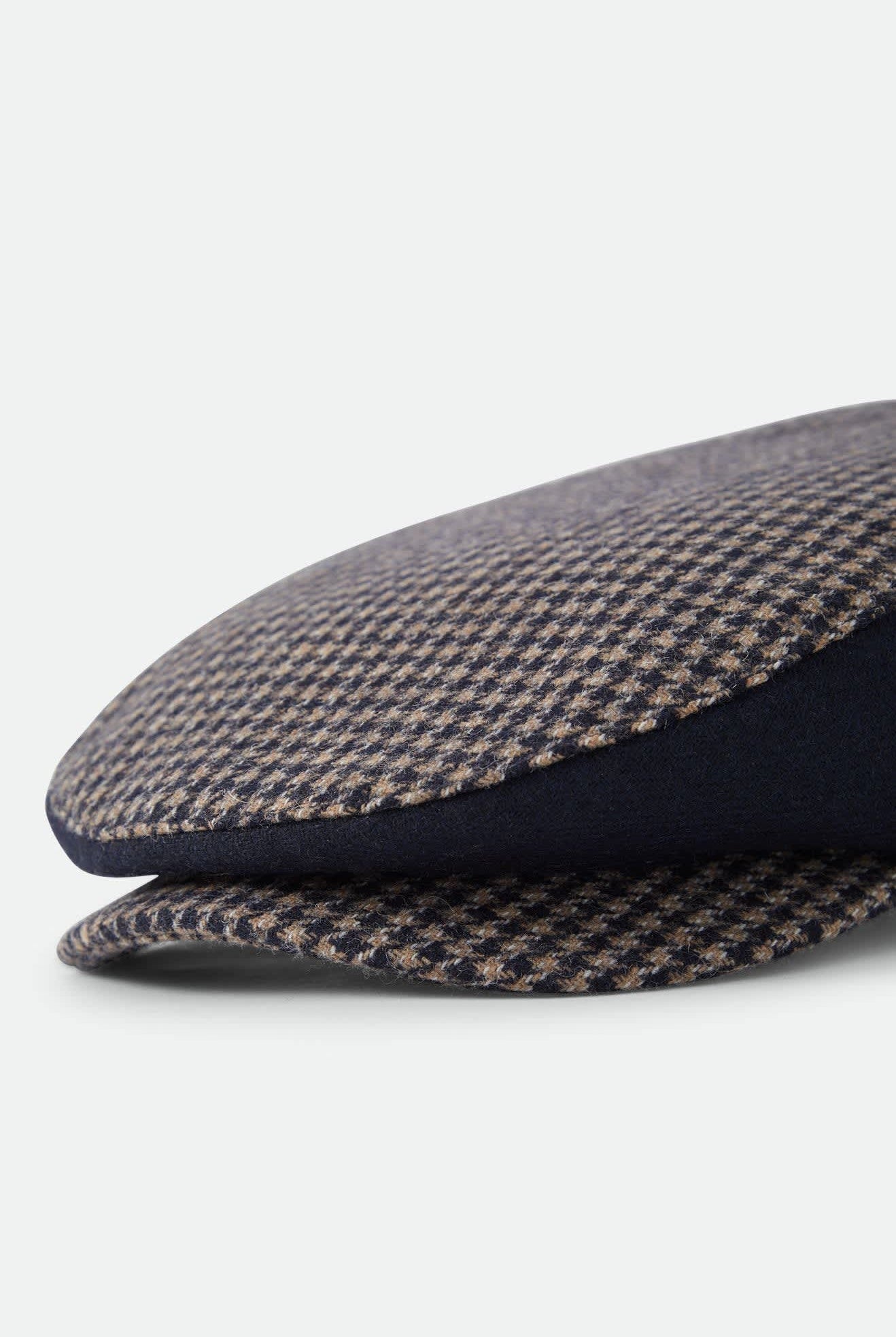 Unisex Hooligan Flat Cap in the color Navy/Sand Houndstooth - Additional Laydown image