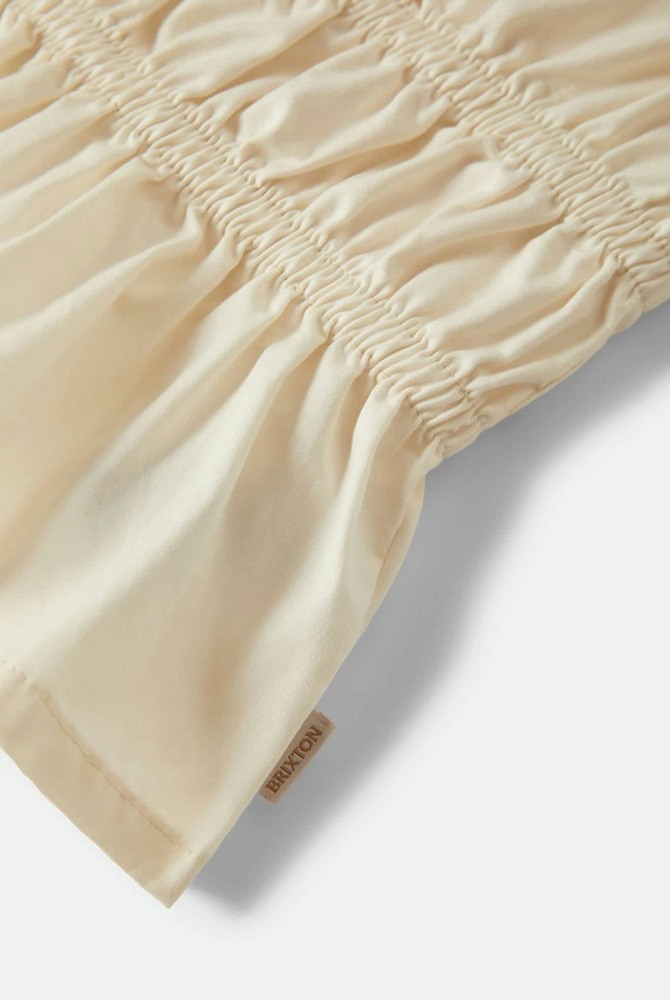 Women's Eden Smocked Top in the color Off White - Additional Laydown image