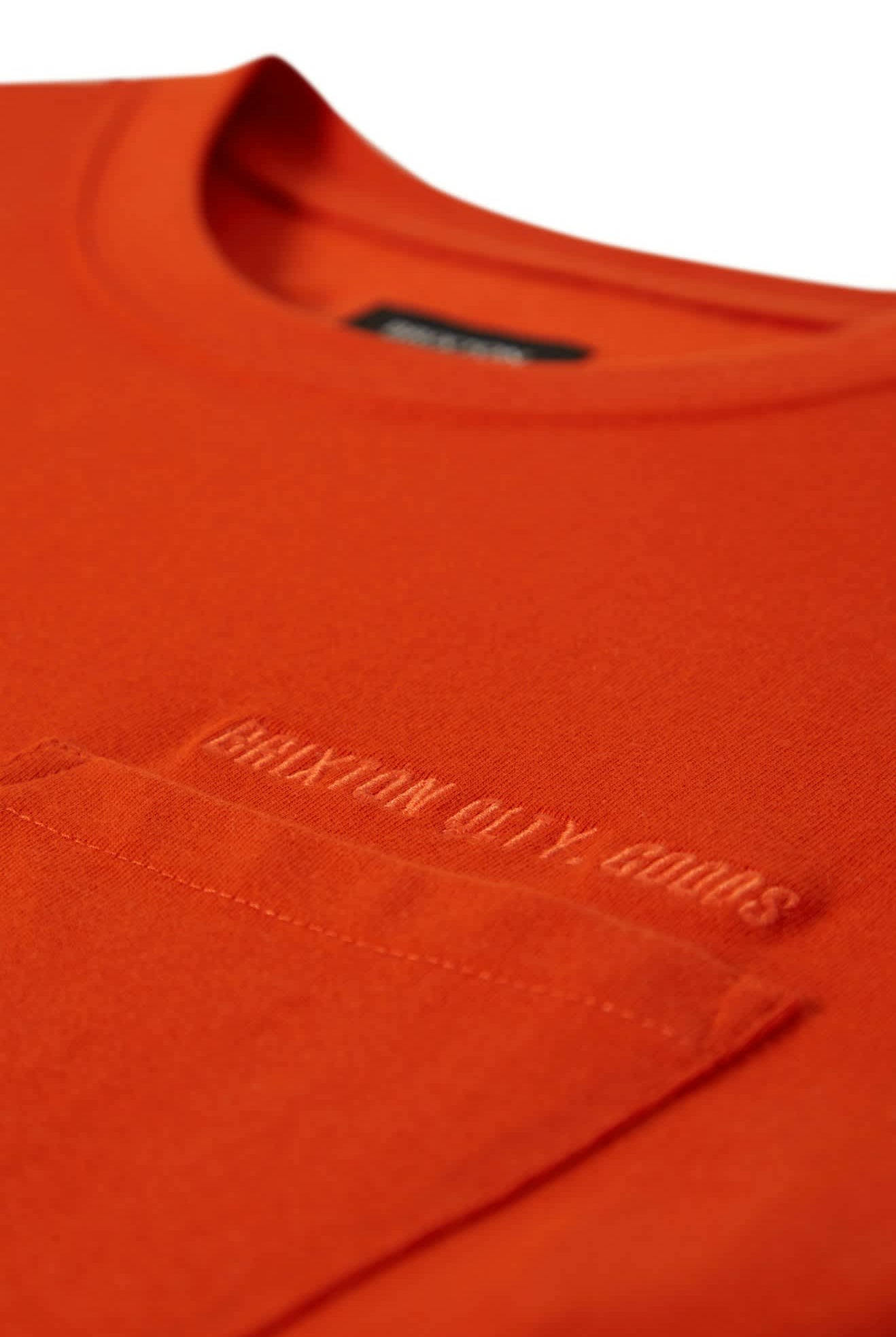 Men's Embroidered Heavyweight S/S Pocket T-Shirt in the color Trail Orange - Additional Laydown image
