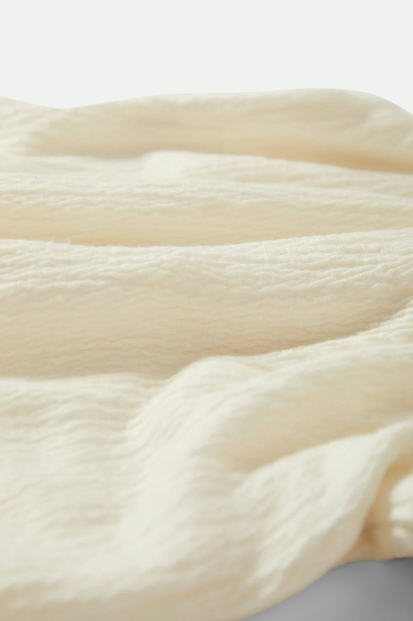 Women's Crinkle Tube Top in the color Off White - Additional Laydown image