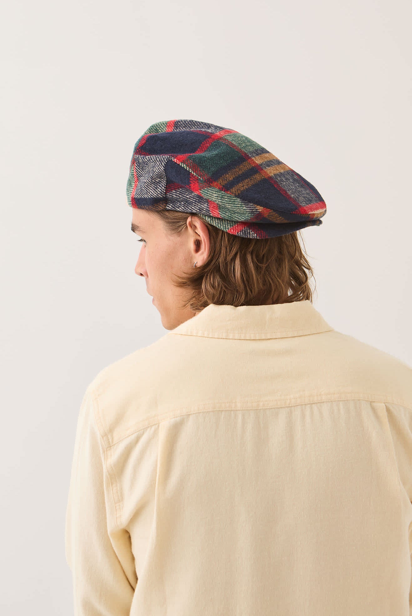 Unisex Century Barrel Snap Cap in the color Navy/Green/Red/Cream - Men's Back View