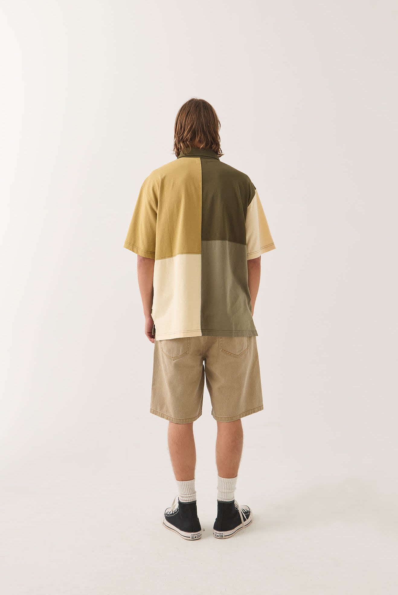 Men's Deco Relaxed Polo T-Shirt in the color Tonal Color Block - Men's Back View