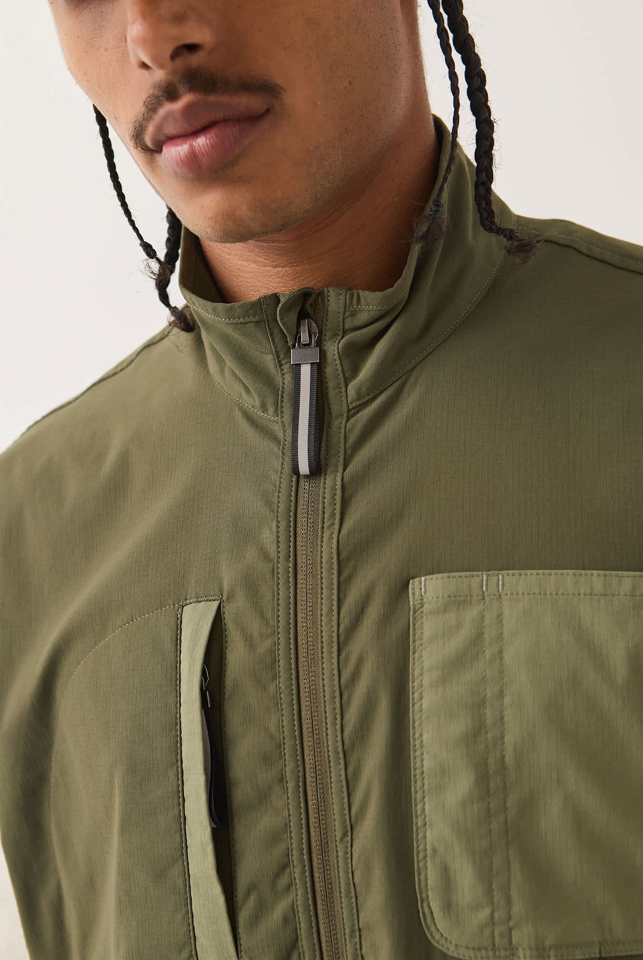 Men's Journey Utility Vest in the color Dark Olive/Olive Surplus - Men's Side View