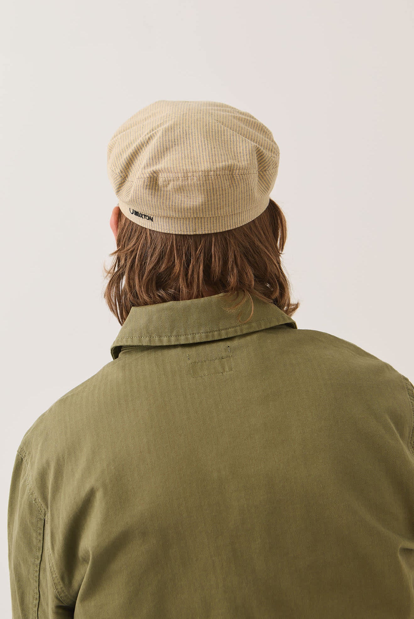 Women's Fiddler Fisherman Cap in the color Khaki Stripe/Washed Black - Men's Back View