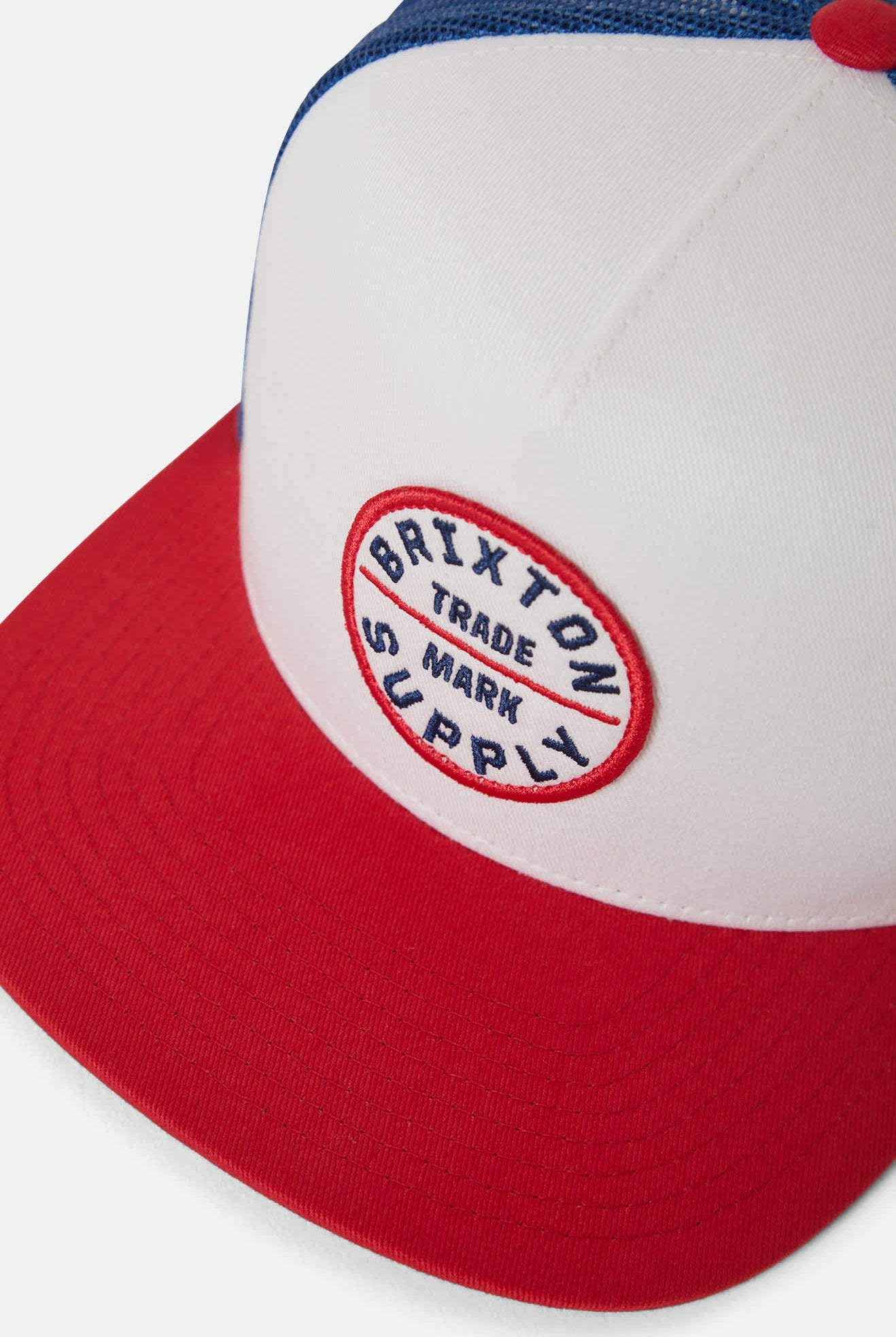 Unisex Oath Trucker Hat in the color White/Midnight Blue/Adrenaline Rush - Additional Laydown image