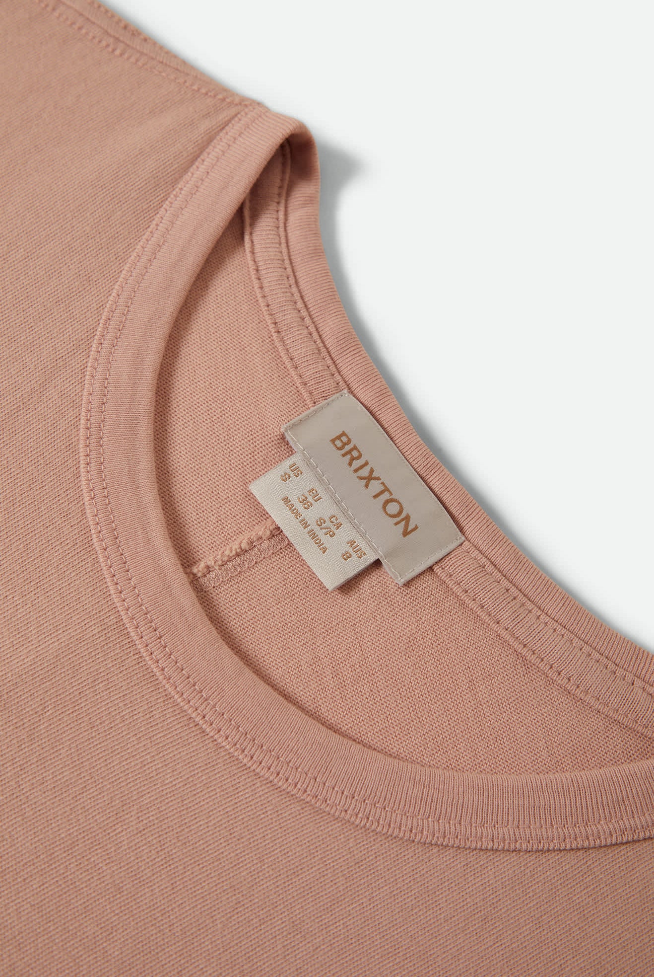 Women's Carefree Organic Garment Dye Muscle Tank in the color Silver Pink - Additional Laydown image