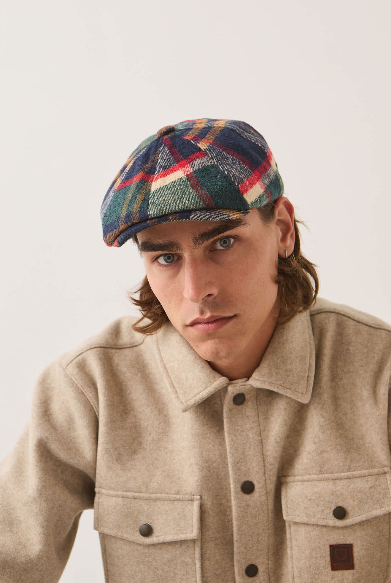 Unisex Brood Newsboy Cap in the color Navy/Green/Red/Cream - Men's Front View
