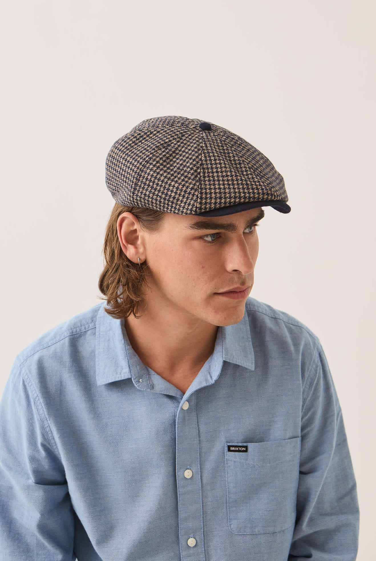 Unisex Brood Newsboy Cap in the color Navy/Sand Houndstooth - Additional Fit image