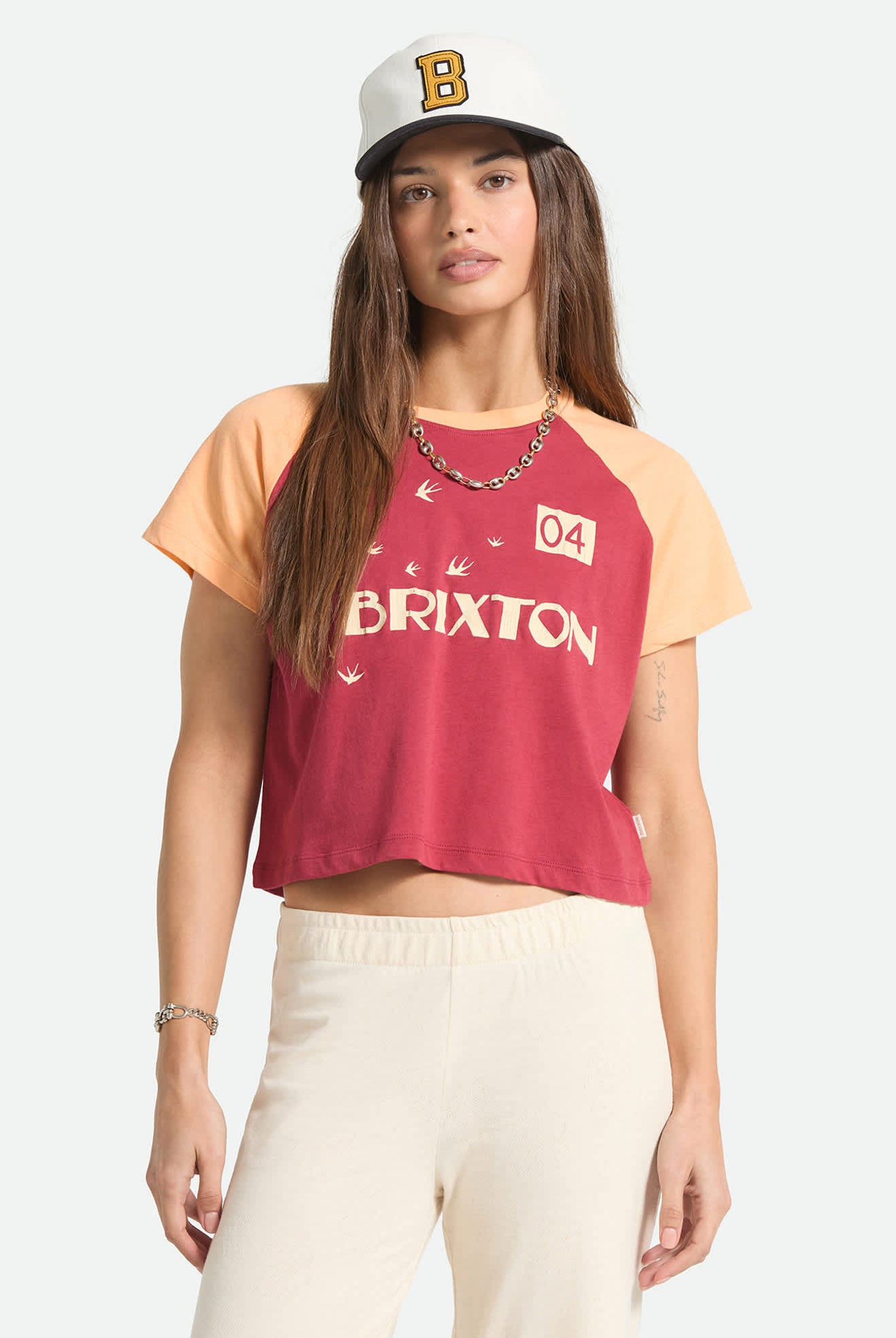 Women's Swallow Sky Cropped Raglan in the color Robust Red/Peach Cobbler - Women's Front View