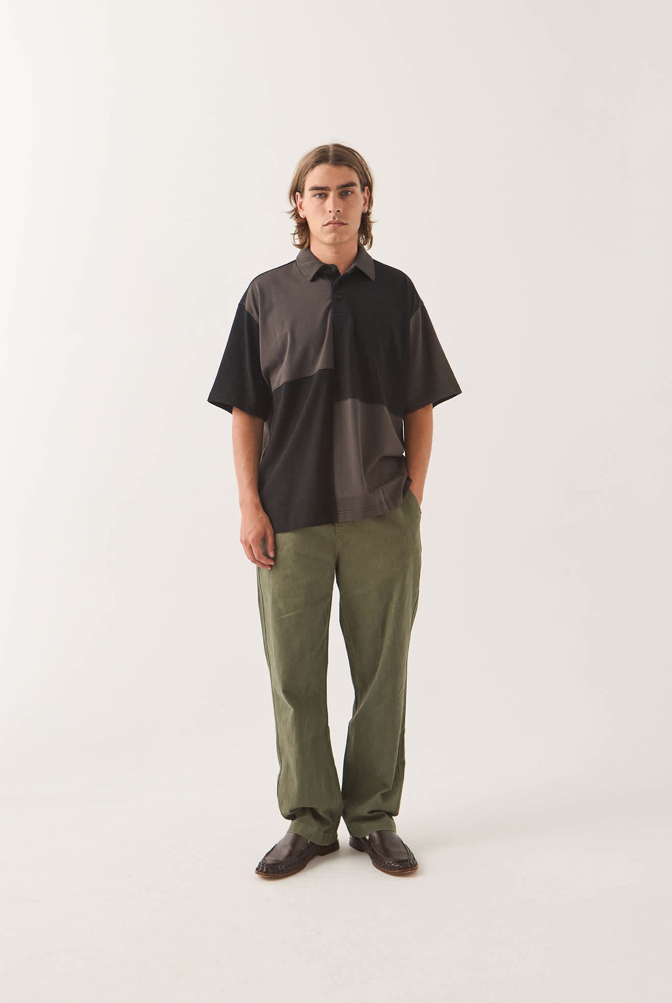 Men's Deco Relaxed Polo T-Shirt in the color Washed Black - Men's Front View