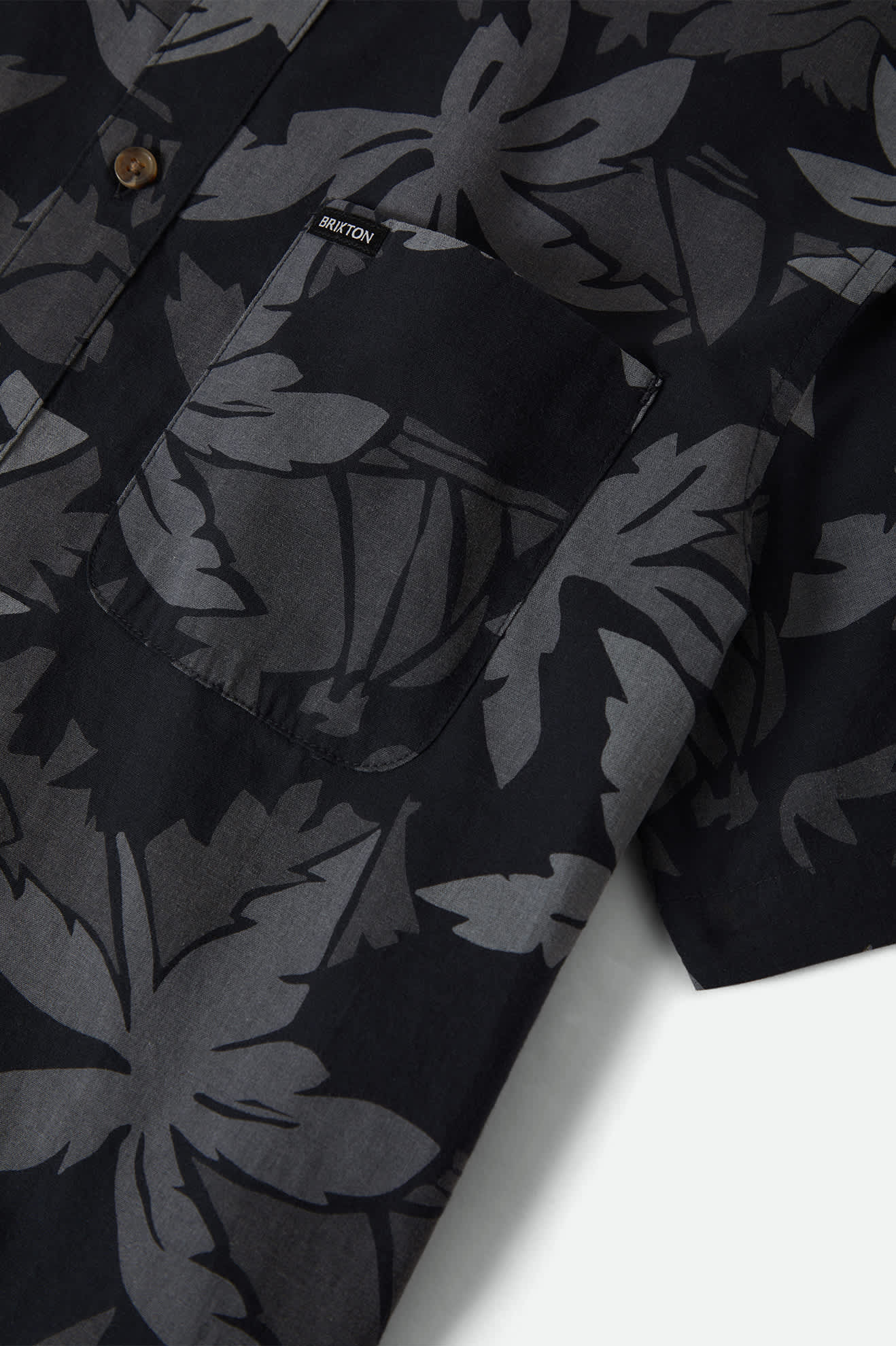 Men's Charter Print Short Sleeve Shirt in the color Black/Trooper/Future Grey Palm Floral - Additional Laydown image