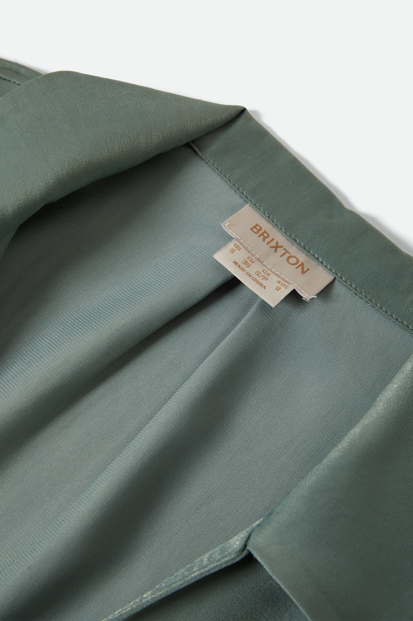 Women's Soho Silky Top in the color Blue Green Shine - Additional Laydown image