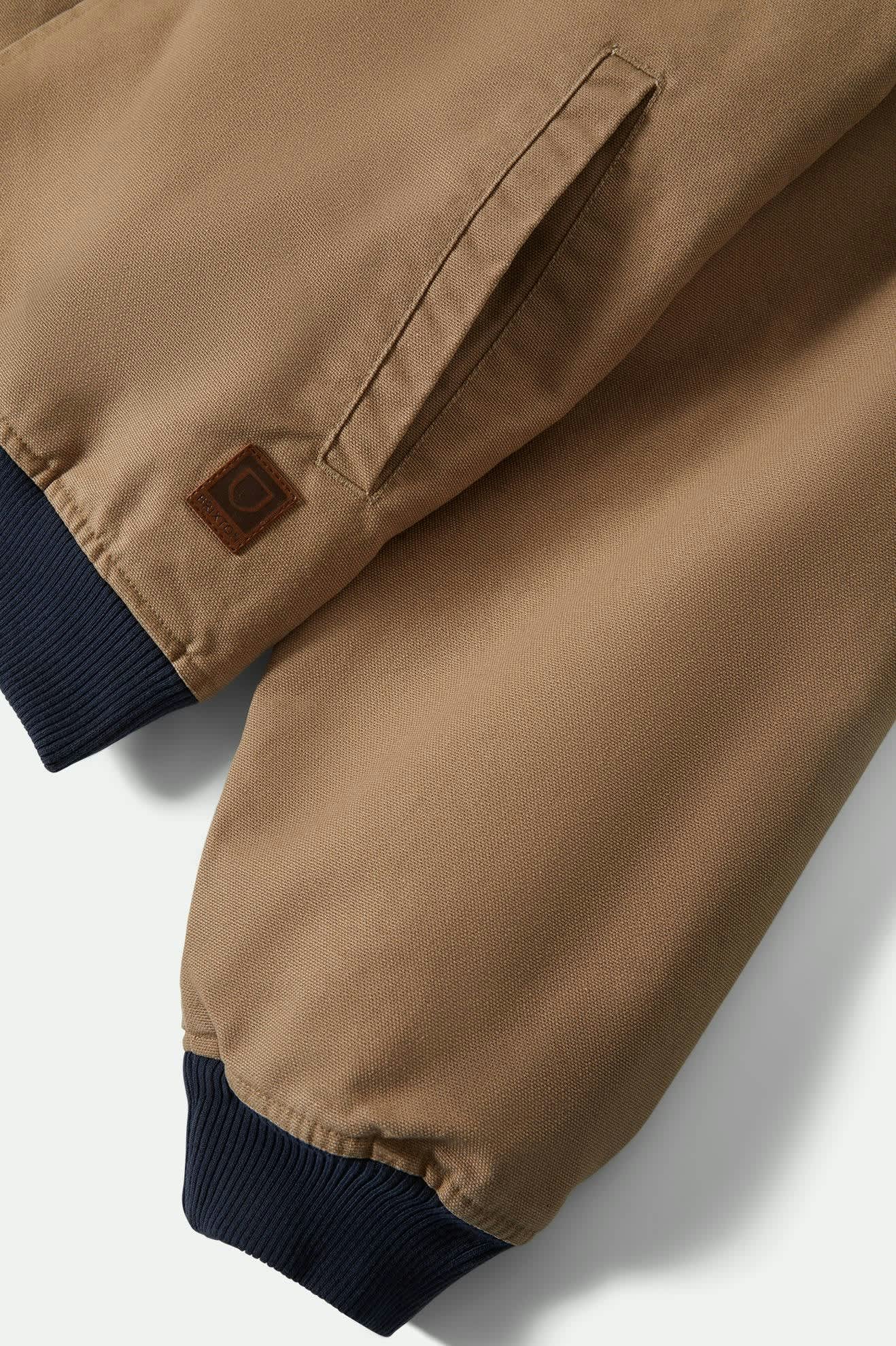 Men's Canvas Hooded Bomber Jacket in the color Khaki/Mood Indigo - Additional Laydown image