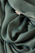 Women's Soho Silky Pant in the color Blue Green Shine - Additional Laydown image