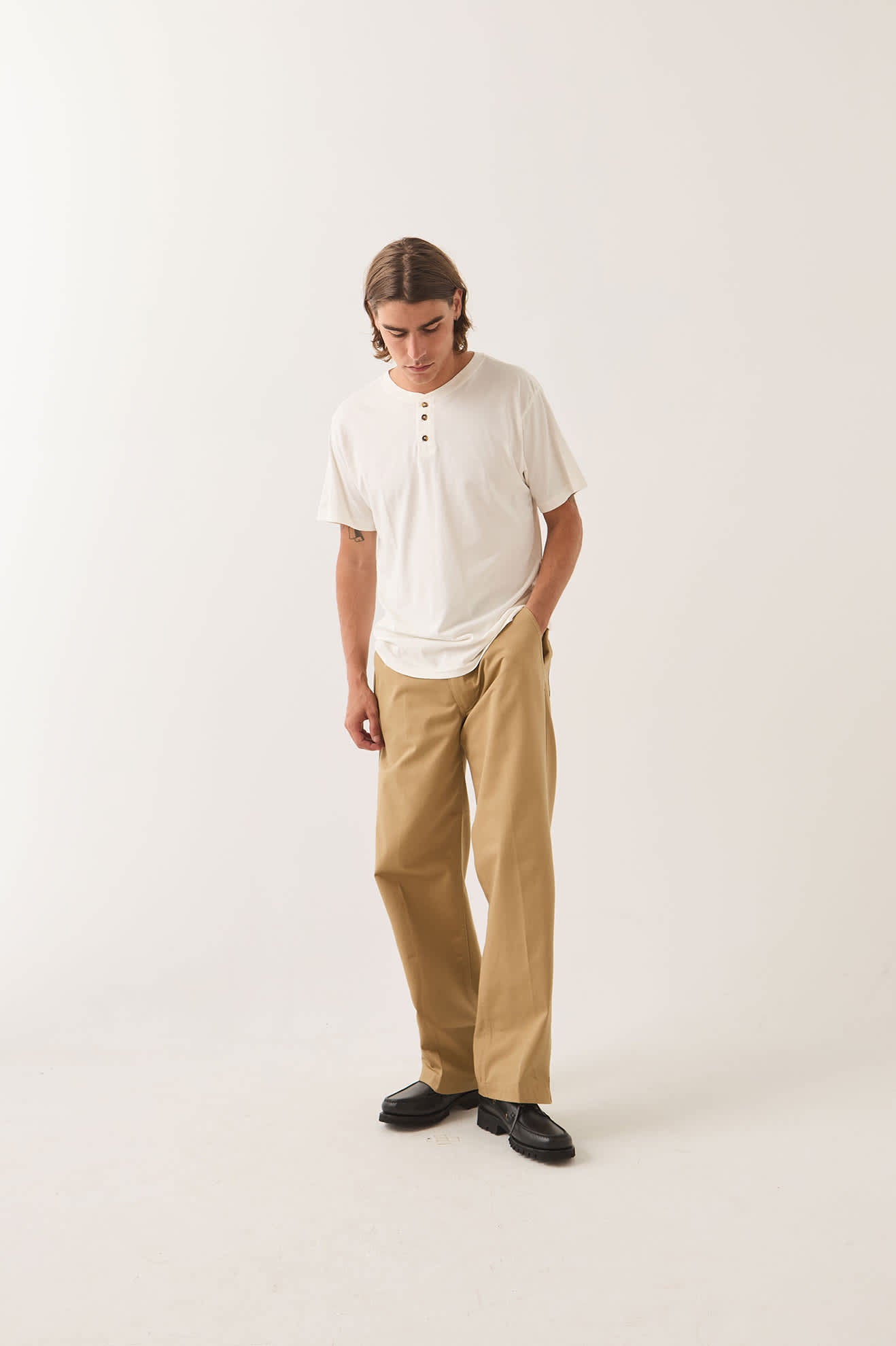 Men's Brixton Baseline Henley T-Shirt in the color Off White Vintage Wash - Men's Side View