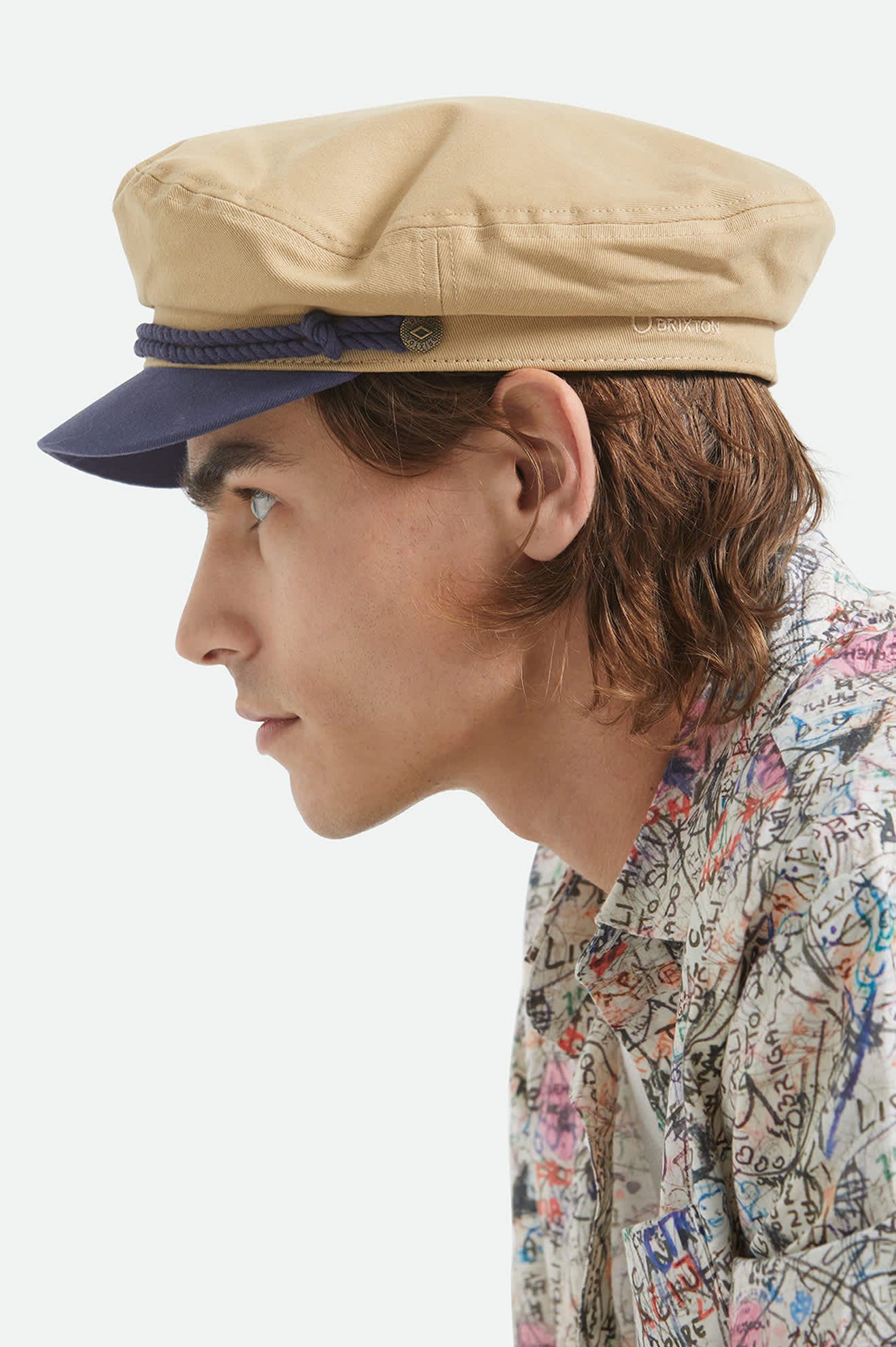 Unisex Fiddler Fisherman Cap in the color Sand/Washed Navy - Men's Side View