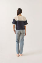 Women's Varsity Mesh T-Shirt in the color Off White/Washed Navy - Women's Back View