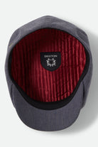Unisex Brood Newsboy Cap in the color Indigo/Dark Sand - Additional Laydown image