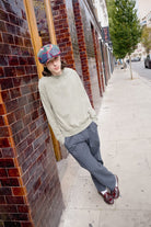 Unisex Barrel Earflap Snap Cap in the color Navy/Green/Red/Cream - Men's Lifestyle image