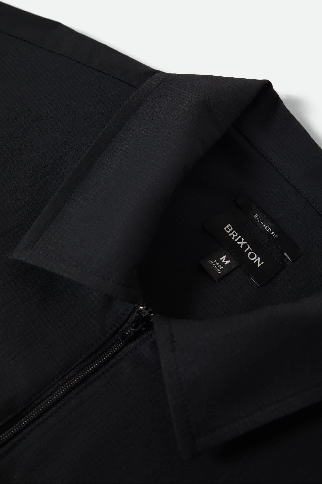 Men's Journey Lightweight 1/2 Zip Cropped Short Sleeve Shirt in the color Black - Additional Laydown image