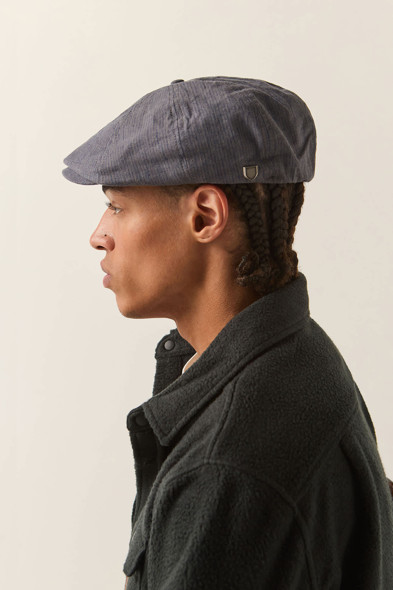 Unisex Brood Newsboy Cap in the color Indigo/Dark Sand - Men's Back View