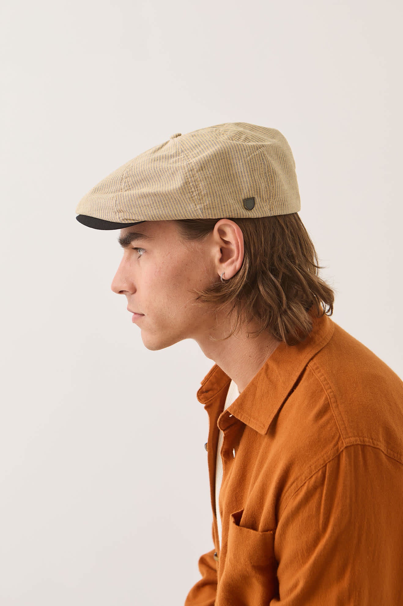 Unisex Brood Newsboy Cap in the color Khaki Stripe/Washed Black - Men's Side View