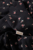 Women's Silky Bowling Button Down Shirt in the color Black Ditsy Floral - Additional Laydown image