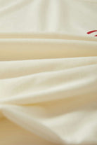 Men's Woodburn Tank Top in the color Off White/Crimson - Additional Laydown image