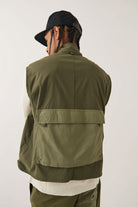 Men's Journey Utility Vest in the color Dark Olive/Olive Surplus - Men's Back View