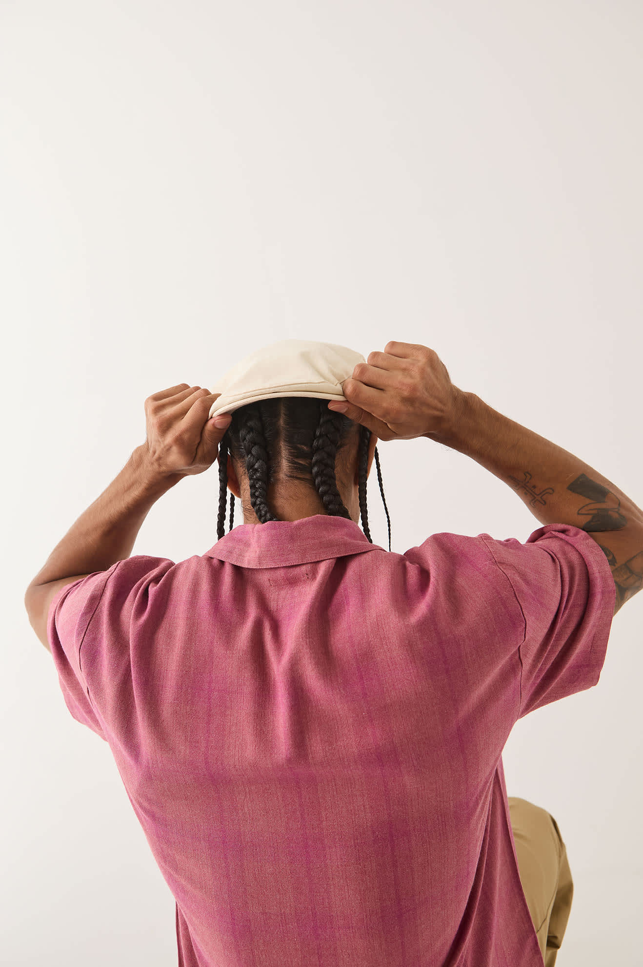 Unisex Hooligan Flat Cap in the color Egret White - Men's Back View