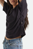 Women's Carefree Organic Garment Dye Cinch T-Shirt in the color Black - Additional Fit image