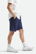 Men's Santo Chino Short in the color Midnight Blue - Men's Side View