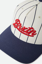 Unisex Jenson Snapback in the color Off White Pinstripe/Classic Navy - Additional Laydown image