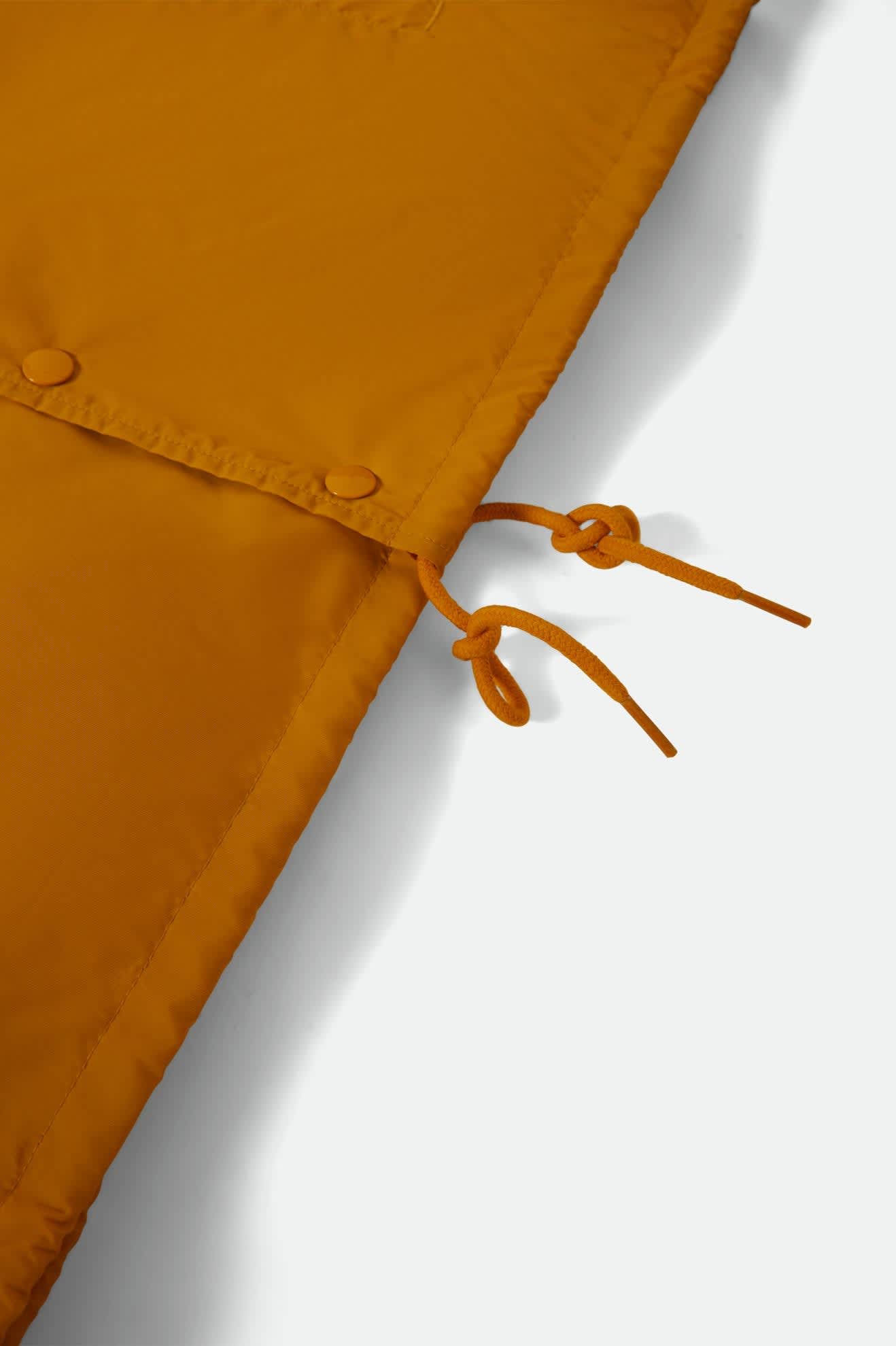 Men's Goodyear Slick Wind Breaker in the color Nugget Gold - Additional Laydown image