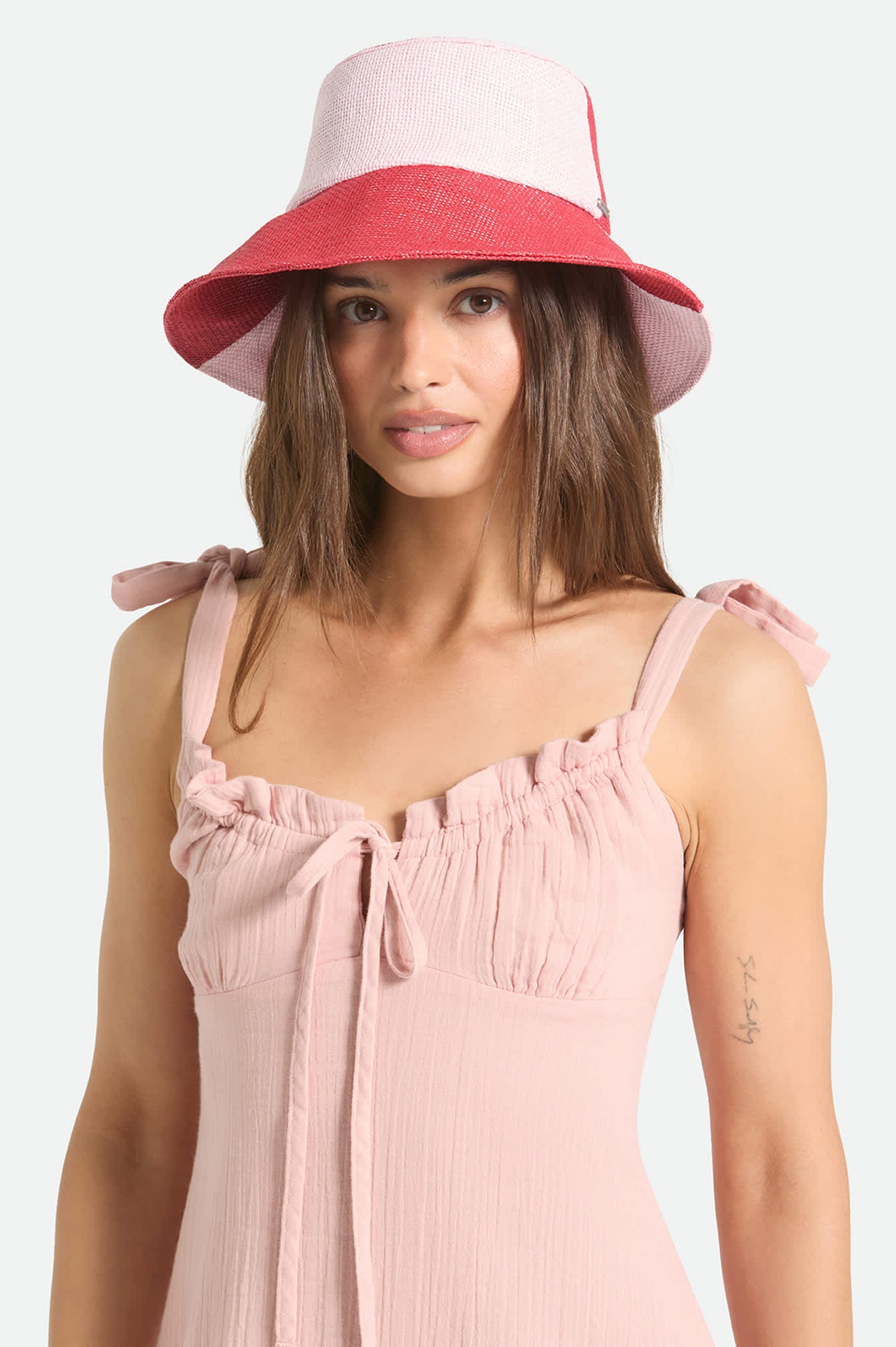 Women's Harmony Packable Bucket Hat in the color Silver Pink/Adrenaline Rush - Women's Front View
