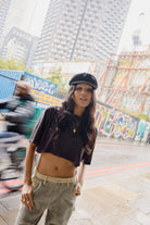 Women's Carefree Organic Garment Dye Cropped Henley in the color Black - Women's Lifestyle image