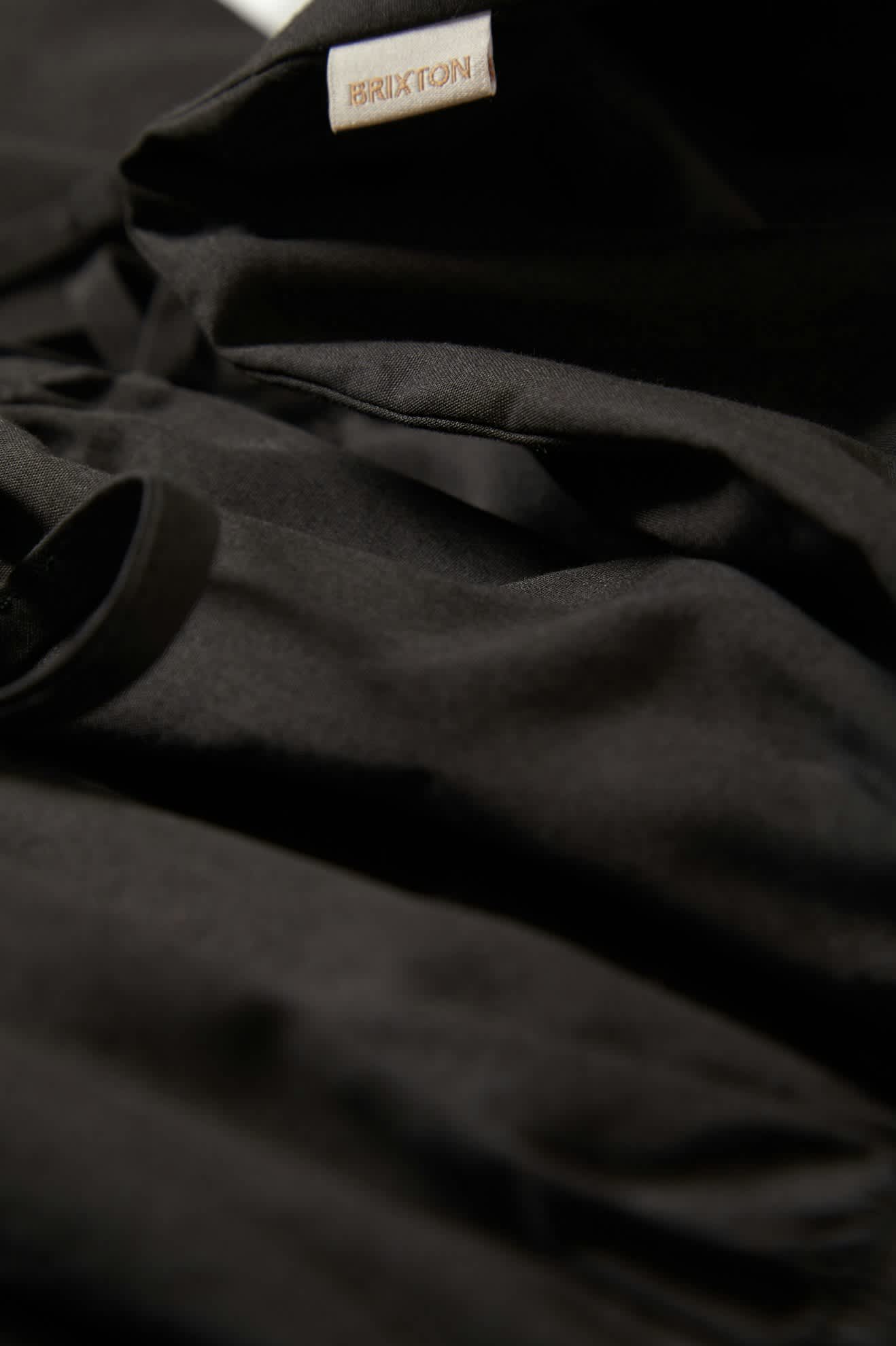 Women's Eden Smocked Jumpsuit in the color Black - Additional Laydown image