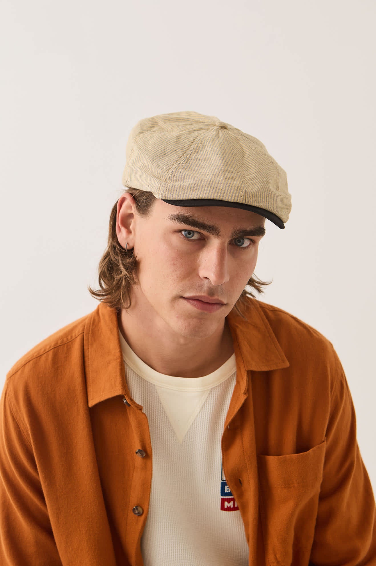 Unisex Brood Newsboy Cap in the color Khaki Stripe/Washed Black - Men's Front View