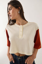 Women's Carefree Organic Garment Dye Cropped Henley in the color Off White/Rust - Additional Fit image