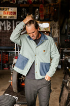Men's Assembly Reversible Chore Jacket in the color Indigo/Pine Needle/Whitecap - Men's Lifestyle image